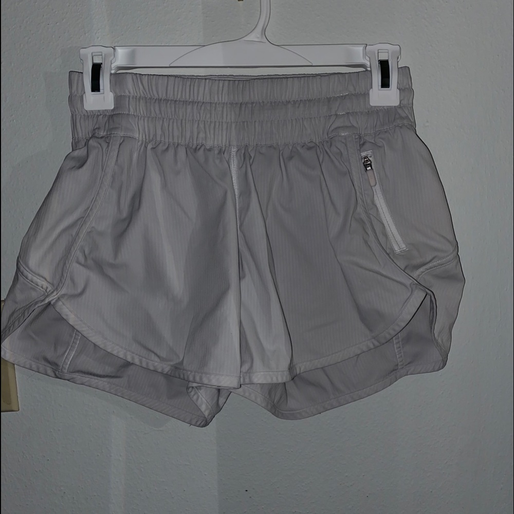 WHITE LULULEMON TRACKER SHORTS